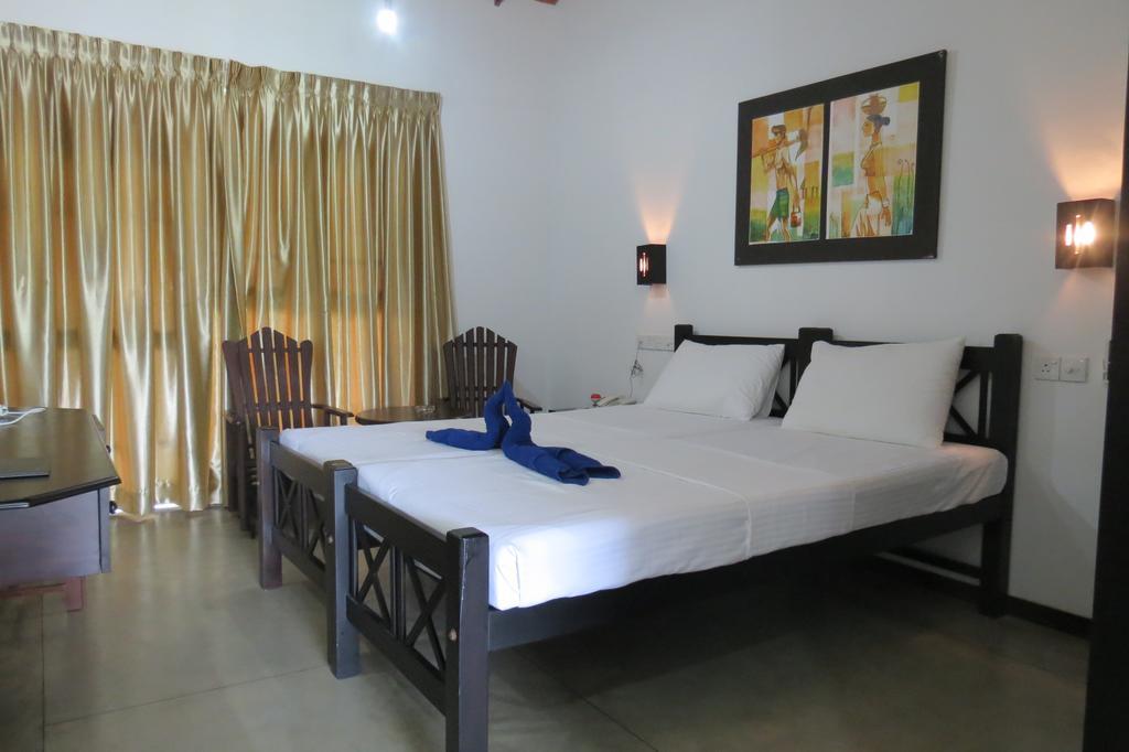 Scandinavia Hotel Hikkaduwa Quarto foto