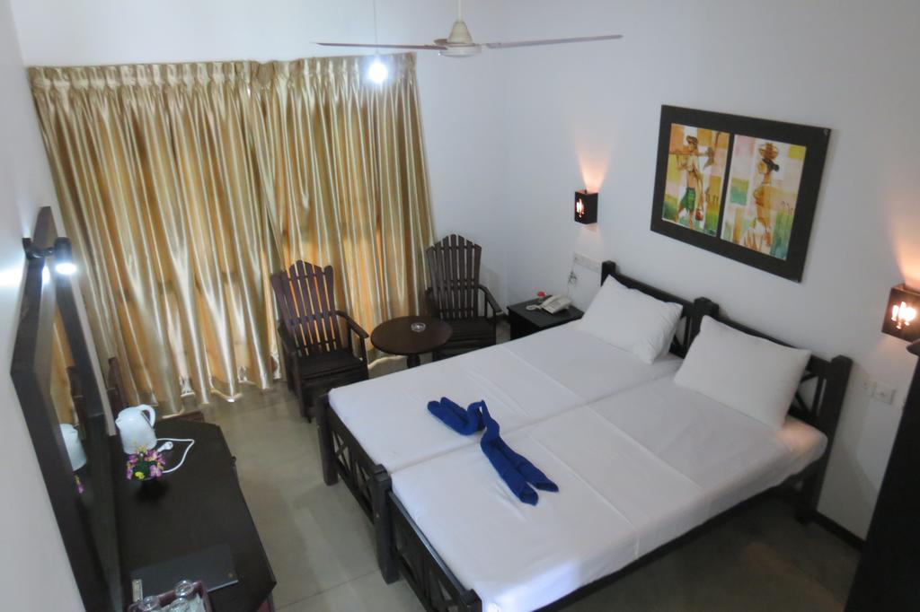 Scandinavia Hotel Hikkaduwa Quarto foto